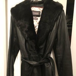 Women’s belted leather jacked with fur trim.